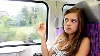 Very young girl flashing in the train