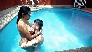 Three guys and one girl fuck in the pool